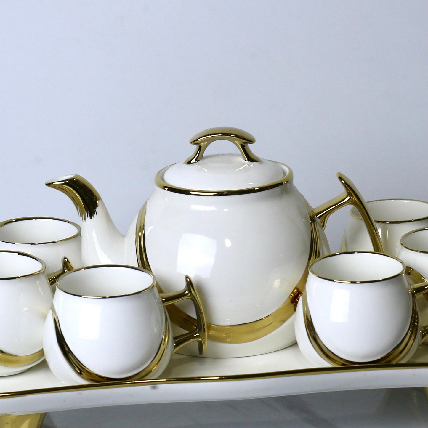Elegant 9-Piece Porcelain Coffee Set with Gold Accents