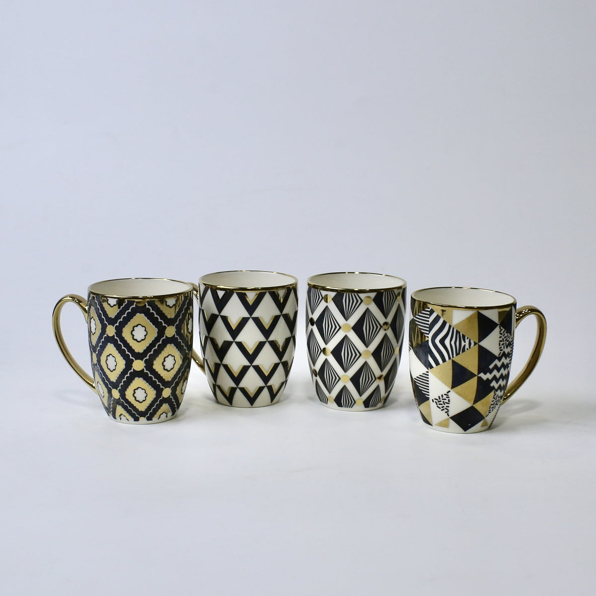 Set of 4 Geometric Bloom Gold Ceramic Mugs – Gold Accent Design | Imperial Nest