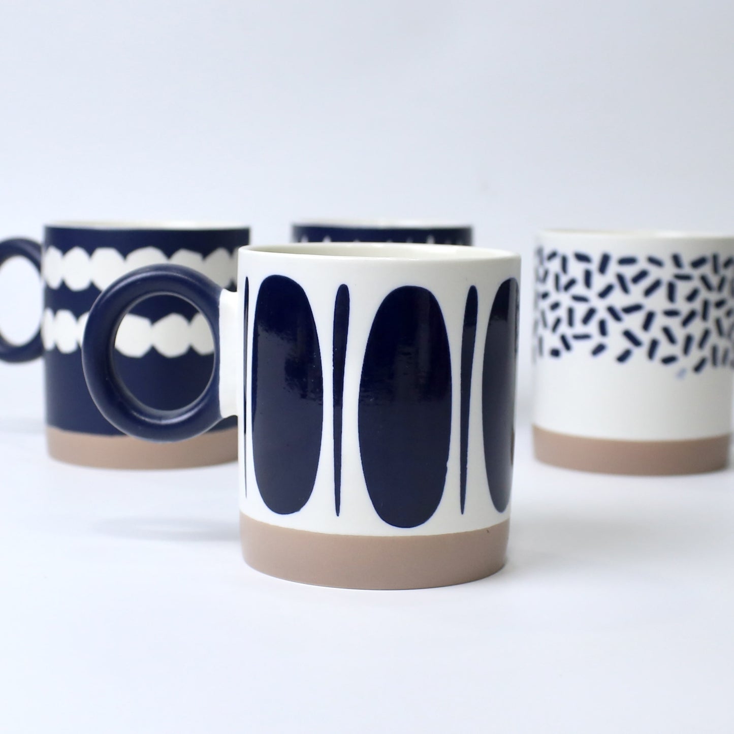 Navy Abstract Ceramic Mugs – Artistic Round Handle Cups | Imperial Nest